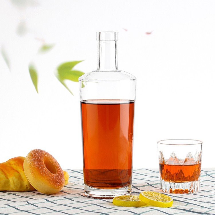 Product Name large glass wine making bottles Glass Material Extra White / Super Flint Bottle Shape Cylinder Shape 750ml Glass Bottle Nominal Capacity 500ml/700ml/750ml/1000ml glass bottle Bottle Weight 650g/680g/750g/800g/850g/1000g Sealing Type Ropp / GPI / Cork / Guala / Swing Top / Custom Sealing Method Application Vodka, Whiskey, Rum, Xo Packaging * 24 pcs / carton, with cardboard separator * 6 pcs / colored box, with cardboard separator * Pallet packaging, with cardboard separator * Carton / box + pallet packaging Decoration * Decal * Silk Screen Printing * Frosting * Spraying colors * Electropla MOQ 6000pcs for a new run; 1 pcs for stock glass bottles Lead Time 35-45 days Decorations Printing, Decal, Painting, Electroplating, Frosting These large glass wine making bottles can be used for mineral water, juice, liquor and other beverage. The bottle is strong and durable. It is high heat resistance and anti- impact. Normally the color is transparent and you can also choose your favorite color. You can choose our exist shape or custom the shape. The cap is normal aluminum screw cap or spring cap or cork cap. The surface of the bottle can be bright, matte, frosted and color spray. Custom logo is available. Normally we can print logo by screen printing, embossed, heat stamping, label sticker or customized. FAQ 1.Can we get free samples? Yes. All of our samples are free and customers just need to cover the freight cost. You can do freight collect, or pay the delivery cost to our paypal account. 2. Can we do printing or label printing on the bottles? Yes you can. Various of printing methods are available like silk screen, hot stamping, frost, color sprayer and lable sticker etc. 3. Can you product bottles according to our designs? Yes. We have rich experience in developing custom models due to years of cooperation with big companies. 4. What is the normal Lead Time? A. For stock products, we will send goods to you within 5-10 days after receiving your payment. B. For mass production, lead time is around 35 days, and longer if surface handling is required 5. What is your shipping terms? A. For samples or trial order, EMS, FEDEX, DHL, UPS, TNT can be provided. B. For larger order, we can arrange shipment by sea or air according to your requirements. We will try to help you choose a best way depending different order conditions. 6. How do you control the quality? We have strict QC quality control system, incl. in-process inspection in every process and final inspection. In addtion, we do leak test for 3 times before packing. 7. If any defective and broken bottles, how can you settle it for us? We will replace the defective and broken bottles in your next order or as you required date. 8.Last but the most important: We sincerely hope that we can establish long-term friendly relations of cooperation, more important is that we will become your friends. Thanks for your kindly attention and interested in our glassware! Any inquiries pls feel free to contact us in your earliest convenience. Product Name large glass wine making bottles Glass Material Extra White / Super Flint Bottle Shape Cylinder Shape 750ml Glass Bottle Nominal Capacity 500ml/700ml/750ml/1000ml glass bottle Bottle Weight 650g/680g/750g/800g/850g/1000g Sealing Type Ropp / GPI / Cork / Guala / Swing Top / Custom Sealing Method Application Vodka, Whiskey, Rum, Xo Packaging * 24 pcs / carton, with cardboard separator * 6 pcs / colored box, with cardboard separator * Pallet packaging, with cardboard separator * Carton / box + pallet packaging Decoration * Decal * Silk Screen Printing * Frosting * Spraying colors * Electropla MOQ 6000pcs for a new run; 1 pcs for stock glass bottles Lead Time 35-45 days Decorations Printing, Decal, Painting, Electroplating, Frosting These large glass wine making bottles can be used for mineral water, juice, liquor and other beverage. The bottle is strong and durable. It is high heat resistance and anti- impact. Normally the color is transparent and you can also choose your favorite color. You can choose our exist shape or custom the shape. The cap is normal aluminum screw cap or spring cap or cork cap. The surface of the bottle can be bright, matte, frosted and color spray. Custom logo is available. Normally we can print logo by screen printing, embossed, heat stamping, label sticker or customized. FAQ 1.Can we get free samples? Yes. All of our samples are free and customers just need to cover the freight cost. You can do freight collect, or pay the delivery cost to our paypal account. 2. Can we do printing or label printing on the bottles? Yes you can. Various of printing methods are available like silk screen, hot stamping, frost, color sprayer and lable sticker etc. 3. Can you product bottles according to our designs? Yes. We have rich experience in developing custom models due to years of cooperation with big companies. 4. What is the normal Lead Time? A. For stock products, we will send goods to you within 5-10 days after receiving your payment. B. For mass production, lead time is around 35 days, and longer if surface handling is required 5. What is your shipping terms? A. For samples or trial order, EMS, FEDEX, DHL, UPS, TNT can be provided. B. For larger order, we can arrange shipment by sea or air according to your requirements. We will try to help you choose a best way depending different order conditions. 6. How do you control the quality? We have strict QC quality control system, incl. in-process inspection in every process and final inspection. In addtion, we do leak test for 3 times before packing. 7. If any defective and broken bottles, how can you settle it for us? We will replace the defective and broken bottles in your next order or as you required date. 8.Last but the most important: We sincerely hope that we can establish long-term friendly relations of cooperation, more important is that we will become your friends. Thanks for your kindly attention and interested in our glassware! Any inquiries pls feel free to contact us in your earliest convenience.